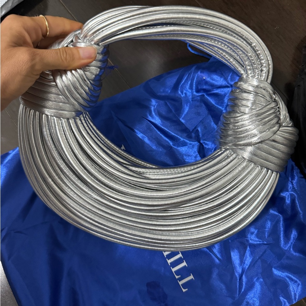 Brand new Silver Metallic Statement bag